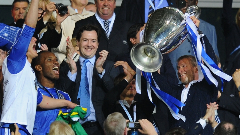 Roman Abramovich (r) sees his club make a profit for the first time since he took over in 2003