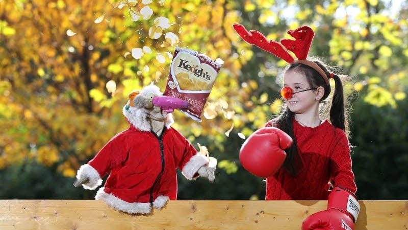 Elisha Stanley squares up to Dustin the Turkey to launch the new Keogh's Farm crisp flavour
