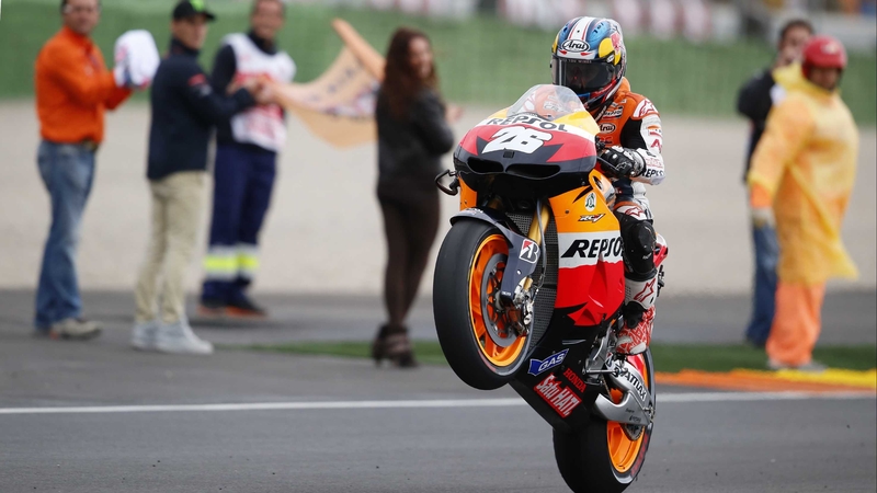 Dani Pedrosa celebrates victory at the Ricardo Tormo racetrack
