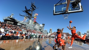 In a special match on the USS Midway, Michael Carter-Williams of Syracuse Orange scores against San Diego State Aztecs