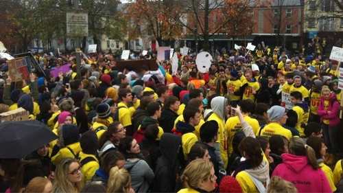 Over 500 students left the square carrying a coffin