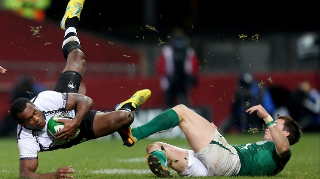 Craig Gilroy helps to stop Watisoni Votu in his tracks