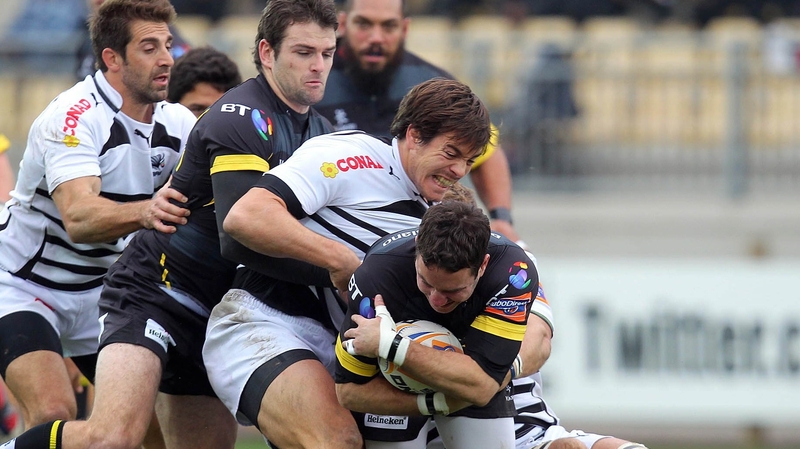 Zebre's Matteo Pratichetti gets a tackle in on Paddy Wallace of Ulster
