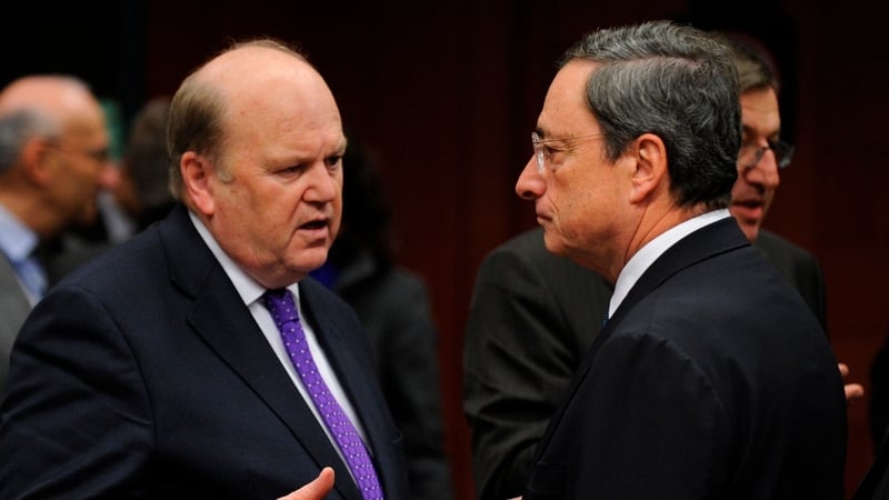 Michael Noonan talks with ECB president Mario Draghi ahead of the meeting