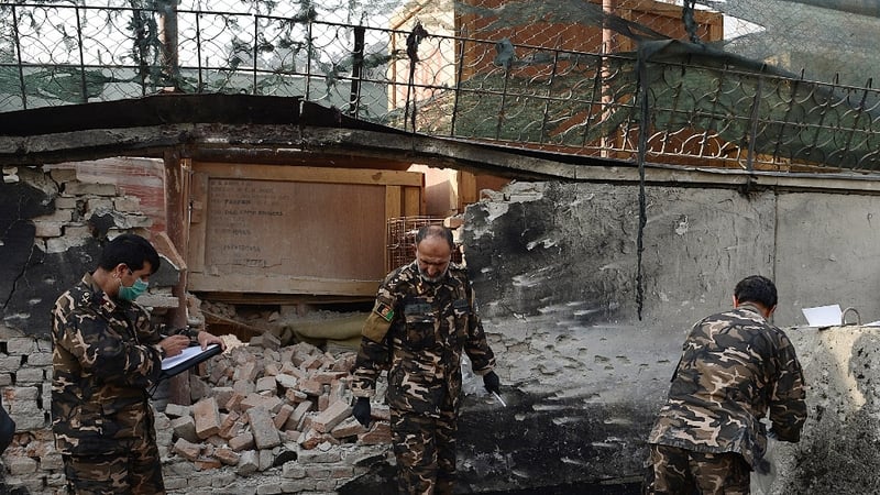 Two Afghan guards were killed in the attack, which was claimed by the Taliban