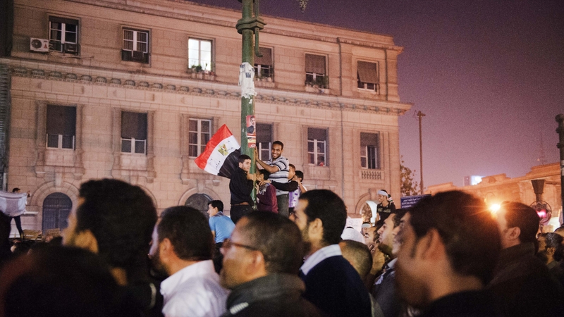 Supporters of Mohammed Mursi gathered outside the high court in Cairo to welcome the decree
