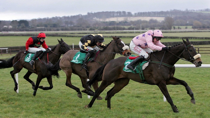 Go Native (R) and Paul Carberry on the way to winning the Johnstown Novice Hurdle in 2009