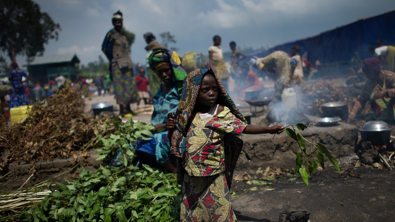 A displaced Congolese child stands in the grounds of a religious organisation on the outskirts of Goma in the east of the Democratic Republic of the Congo