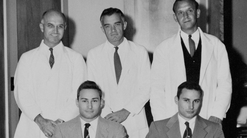 Dr Joseph Murray (back left) carried out the operation on twins Richard and Ron Herrick in 1954