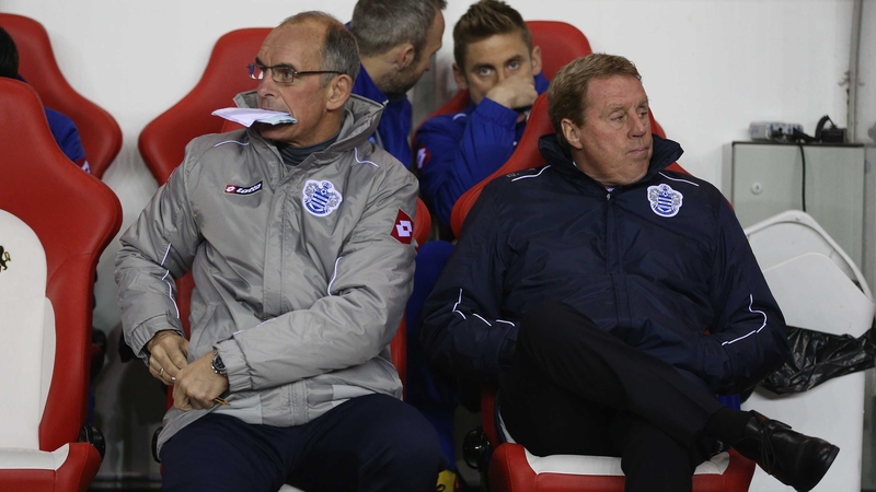 QPR manager Harry Redknapp (r) sits next to his assistant manager Joe Jordan