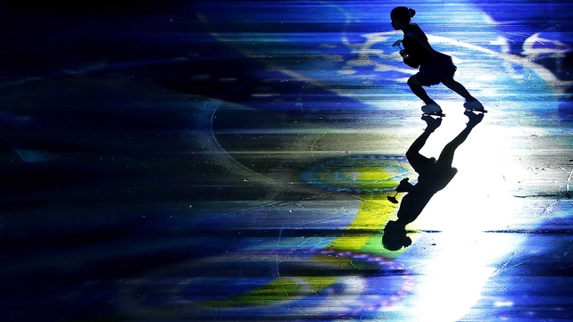 A girl performs on ice for 'Thank you from Tohoku' in the Gala Exhibition during day three of the ISU Grand Prix of Figure Skating NHK Trophy
