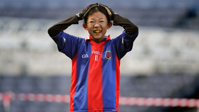 Gaelscoil Chnoc Liamhna's Chloe Ni Chonchuir watches play during the Allianz Cumann na mBunscol Primary School Football Finals