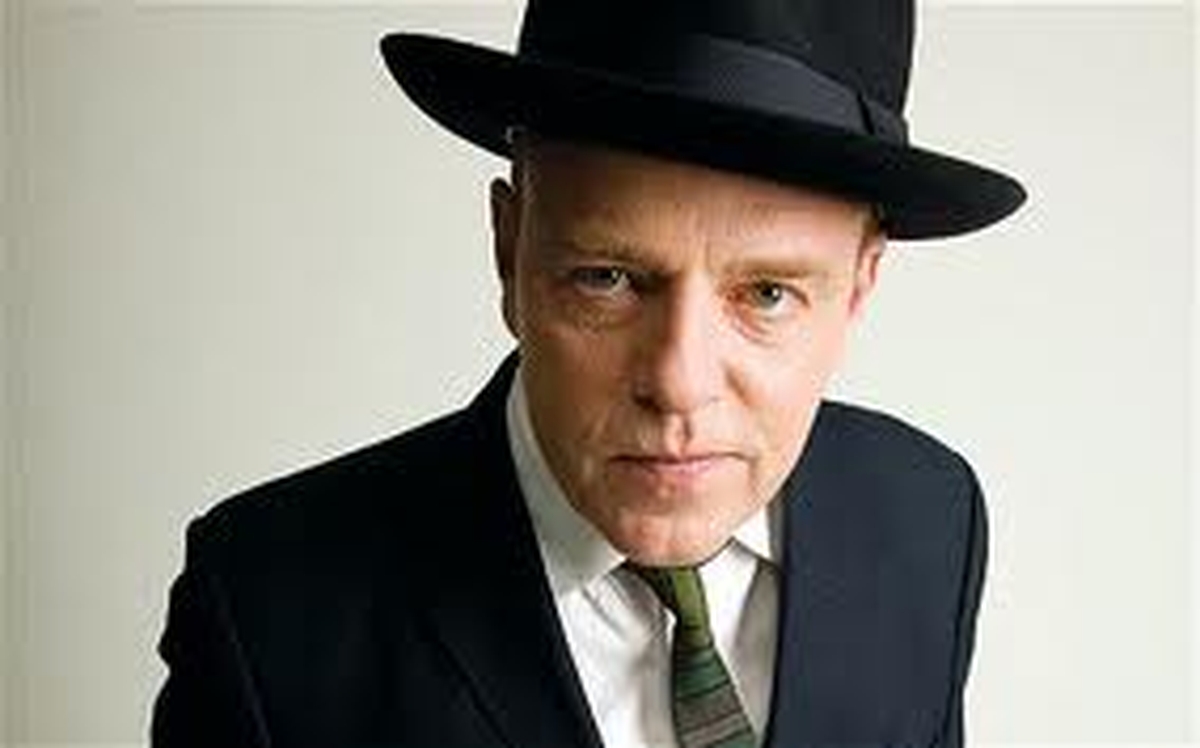 John speaks to Madness lead singer Suggs
