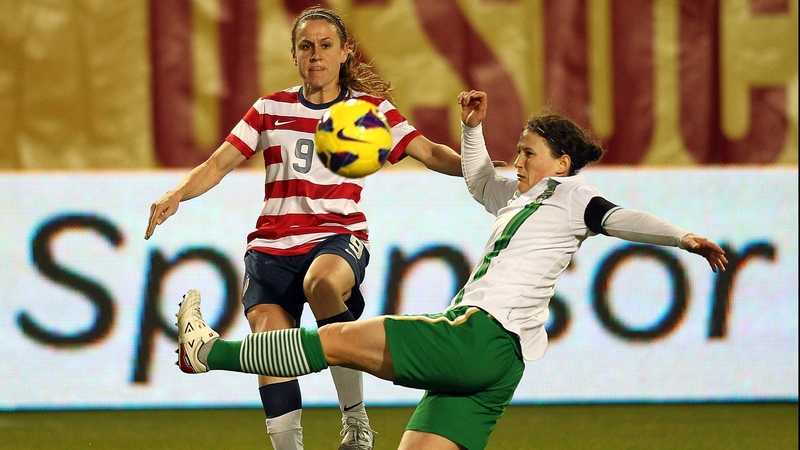 Ireland's Shannon Smyth tackles Heather O'Reilly during the midweek loss