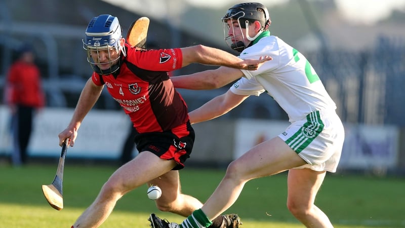 Oulart's Barry Kehoe battles with Patrick Reid for posession