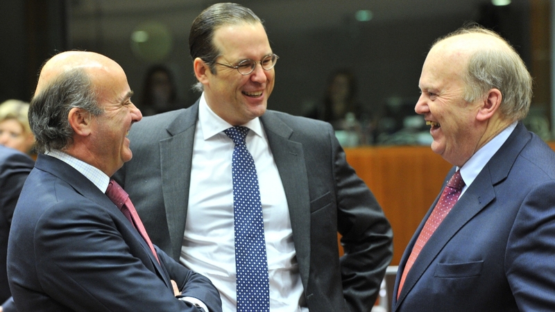 Finance Minister Michael Noonan (R) will be particularly interested in the single bank supervisor