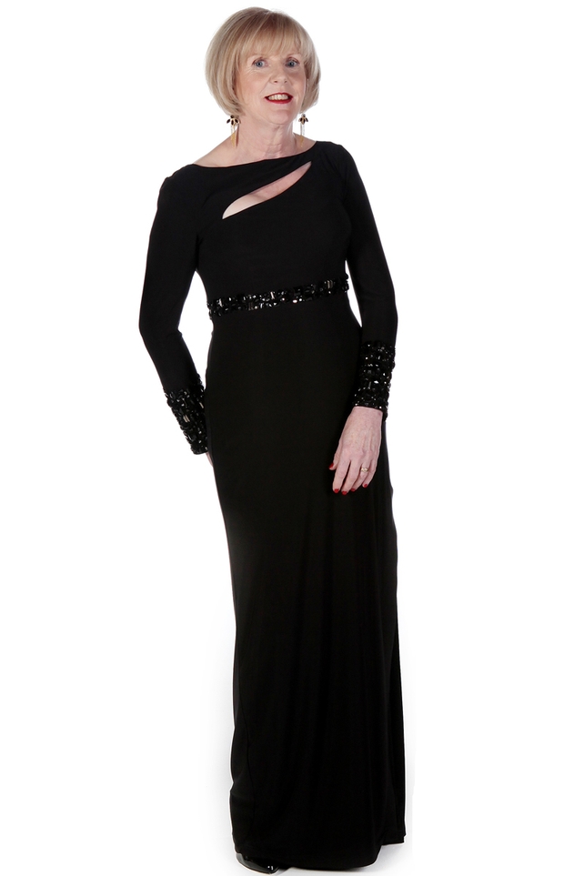 Floor length black gown with embroidery detail Ben de Lisi at Debenhams €217, Black patent court New Look	 €22.99, Green and black droplet earring Loulrie €345