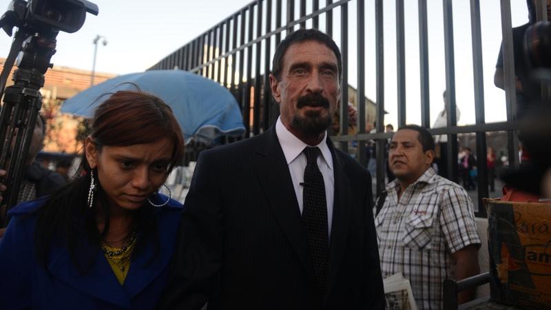 Police in Belize want to question John McAfee but say he is not a prime suspect in the killing of Gregory Faull