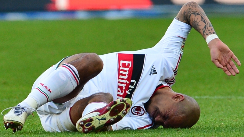 Nigel De Jong reacts in pain after injuring his Achilles