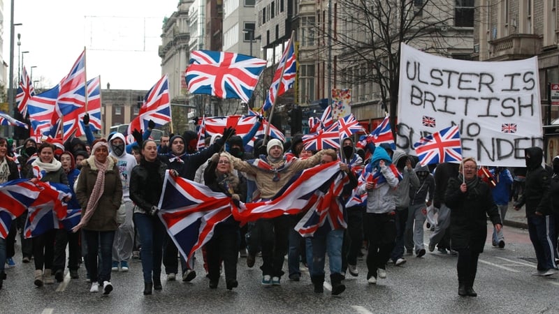 There have been protests over the reduction in the number of days that the union flag flies over Belfast City Hall
