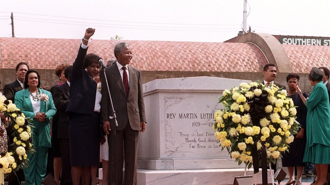 Nelson Mandela in Atlanta on 27 June 1990 with his wife Winnie after placing a wreath at the grave of Martin Luther King Jnr