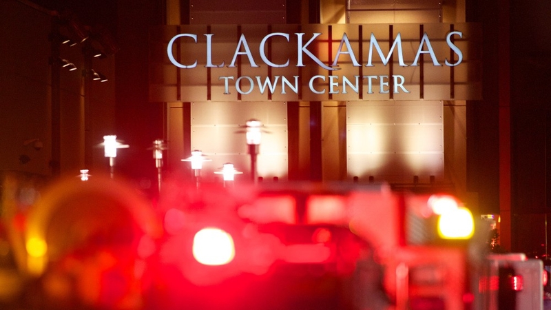 Emergency vehicles gather outside the Clackamas Town Center mall in Oregon