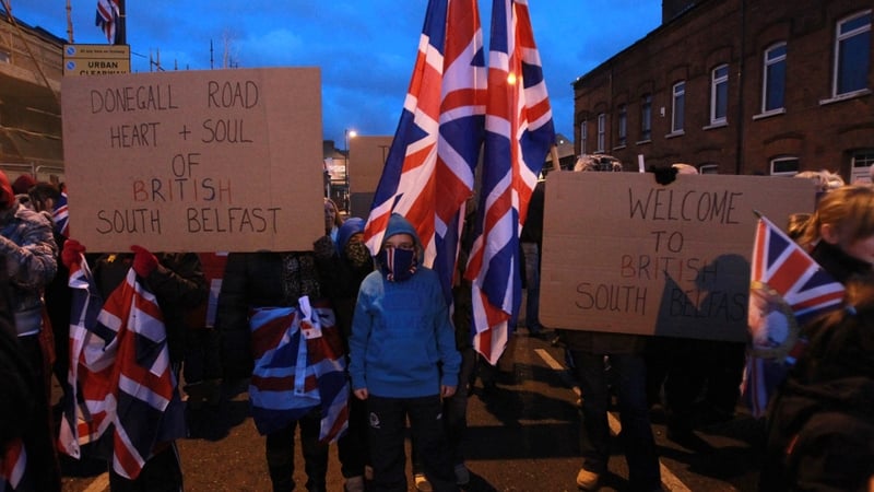 Protesters have taken to the streets over a reduction in number of days union flag flies