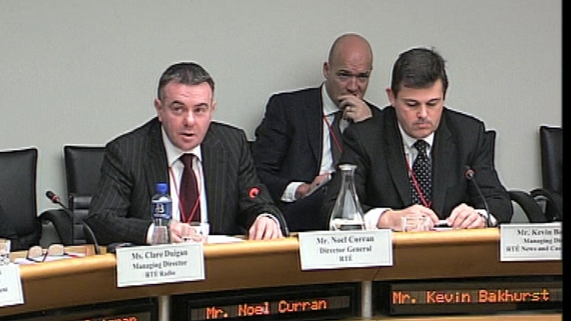 Noel Curran (l) seated alongside Managing Director of News and Current Affairs Kevin Bakhurst at the Committee