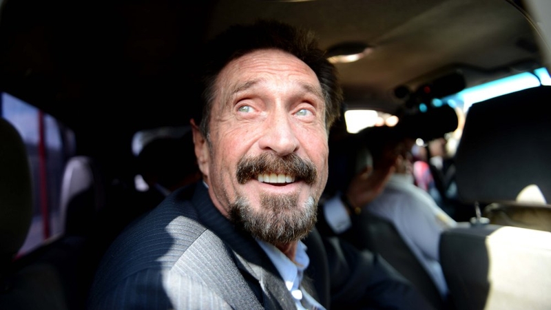 John McAfee arrives at the Aurora international airport in Guatemala City