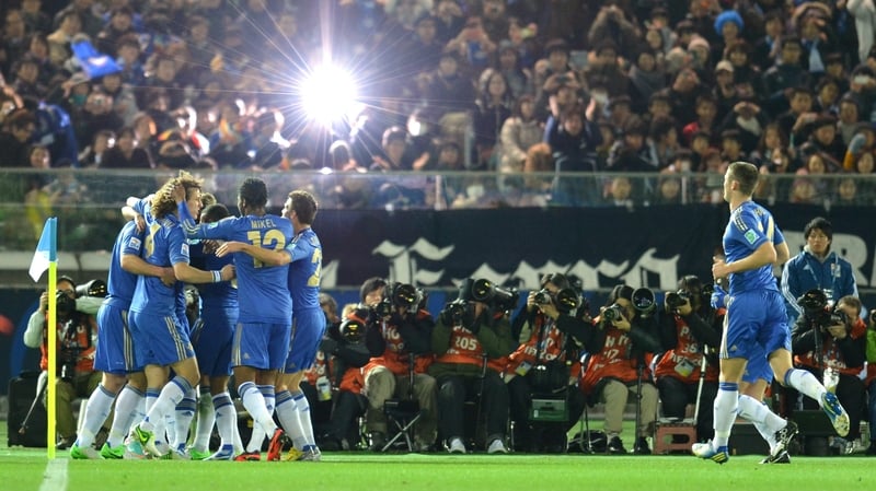 Chelsea players celebrate with Juan Mata after scoring his side's opener against Mexico's Monterrey