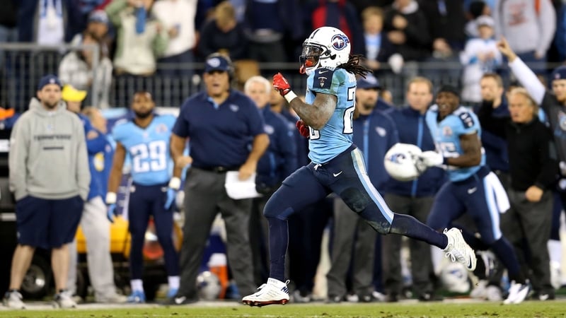 Running back Chris Johnson of the Tennessee Titans runs with the ball to score a 94-yard touchdown