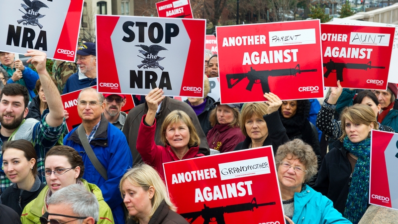 Protesters descend on the Washington offices of the National Rifle Association