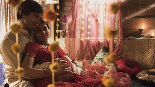 Midnight's child Saleem Sinia with Parvati (Shriya Saran). She was born seven seconds after midnight, and is a witch with great powers.
