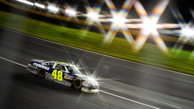 Jimmie Johnson, driver of the MyLowe's Chevrolet, races during the NASCAR Sprint Cup Series Bank of America 500