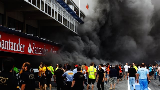 Fire breaks out at the back of the Williams team garage as they celebrate winning the Spanish Formula One Grand Prix