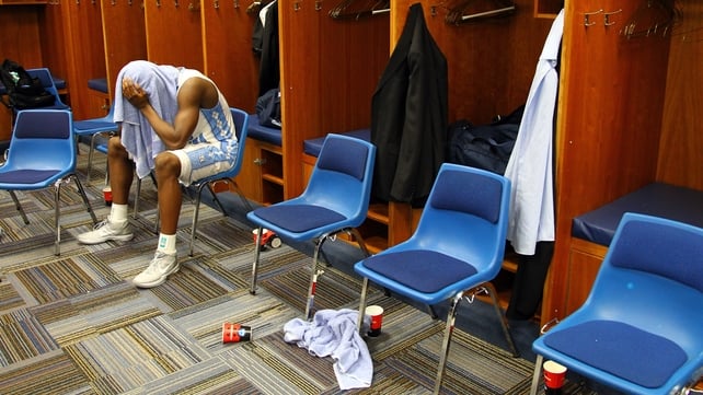 Dejection in the dressing room after the NCAA Men's Basketball Midwest Regional Final