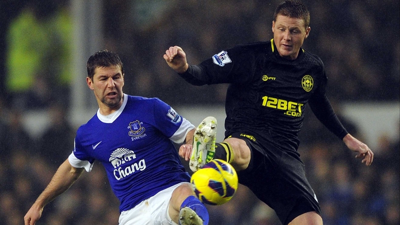 Thomas Hitzlsperger of Everton in action with James McCarthy of Wigan