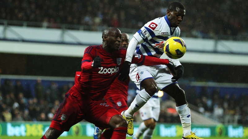 Marc-Antoine Fortune (left) of West Bromwich Albion and Shaun Wright-Phillips (right) of QPR