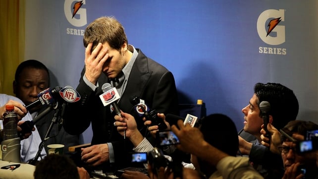 New England Patriots quarterback Tom Brady breaks down as he faces the media after losing to the New York Giants in Super Bowl XLVI