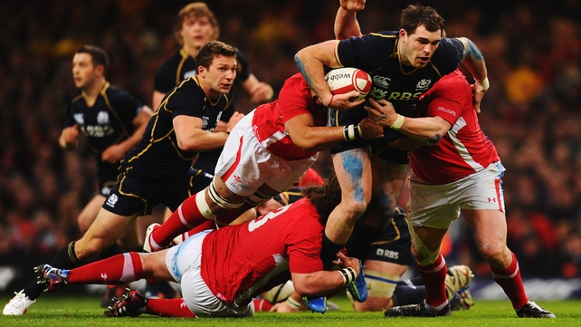 Sean Lamont of Scotland attacks the Welsh defence during their Six Nations clash