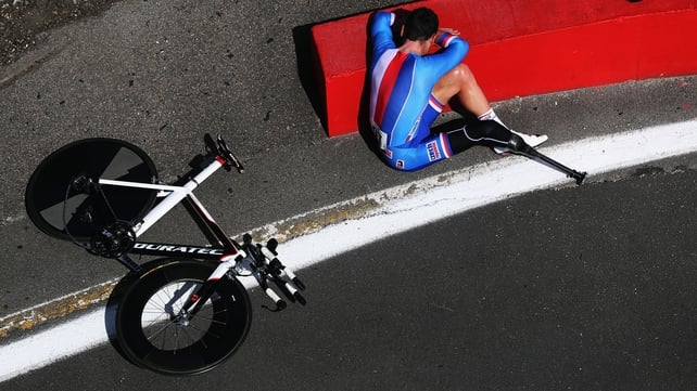 At the Paralympics, Jiri Jezek of the Czech Republic reacts to winning the C4 men's individual time-trial