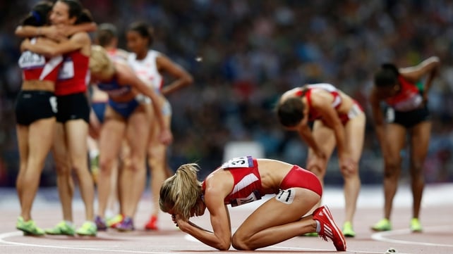 Morgan Uceny of the US is distraught after falling during the women's 1500m final