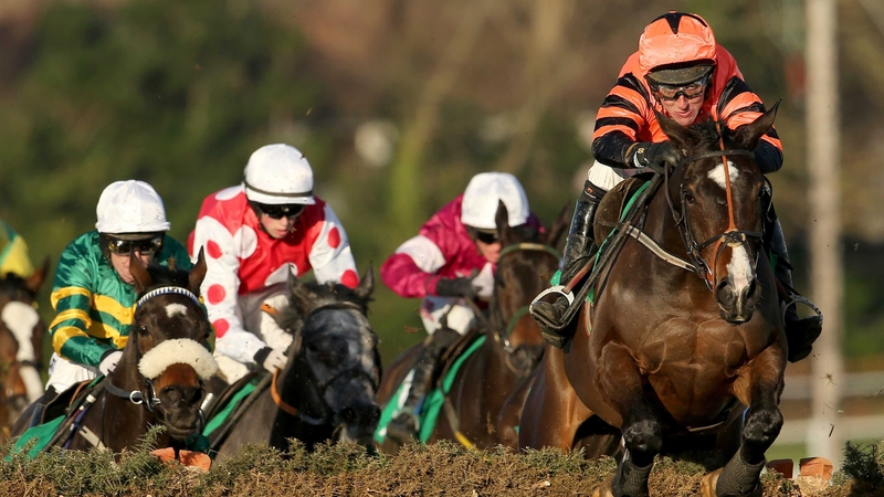 Jezki ridden by Robbie Power clears the last to win the Paddy Power Future Champions Novice Hurdle