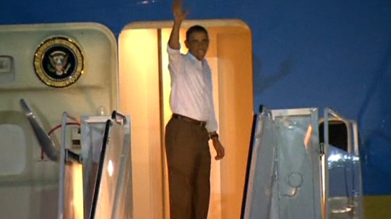 US President Barack Obama returned to Washington after cutting short his Christmas holiday in Hawaii.