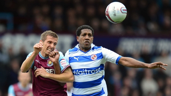 Gary O'Neil (L) of West Ham battles with Mikele Leigertwood