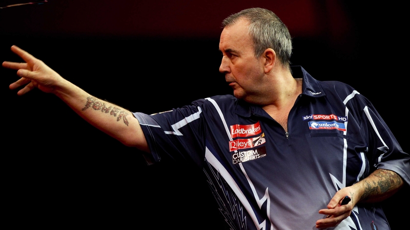 Phil Taylor survived a fightback from Raymond van Barneveld to reach