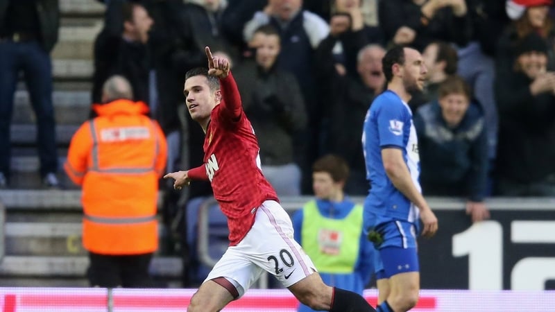 Robin van Persie celebrates after scoring his first at the DW