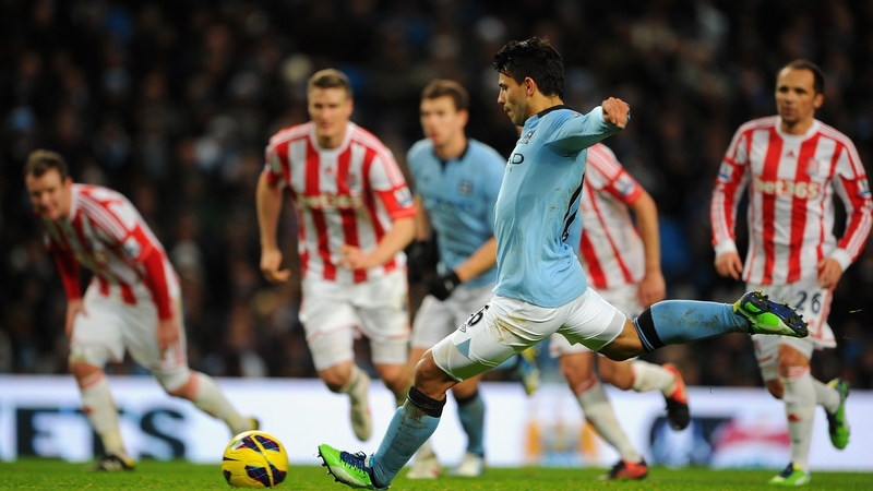Sergio Aguero of Manchester City scores from a penalty against Stoke