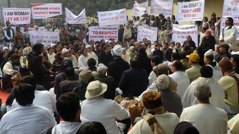 Protesters braved chilly weather in New Delhi to hold candlelight vigils