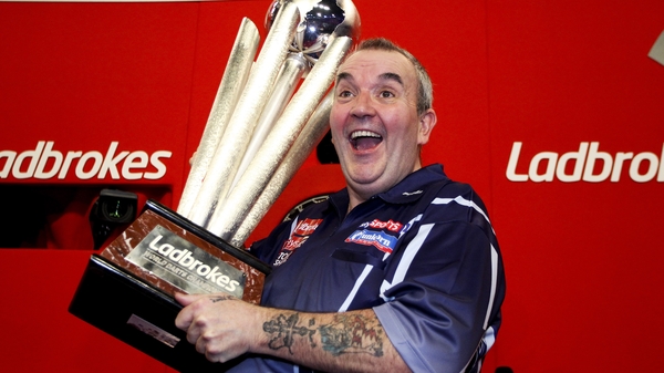 Taylor showed all his years of experience to make it a 'sweet 16' of world titles